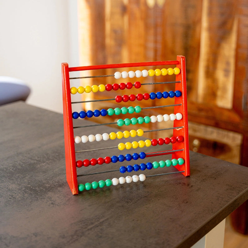 Bunter Abakus als Therapiematerial zur Förderung von Konzentration Feinmotorik und spielerischem Lernen in der Ergotherapie Therapiezentrum Möller
